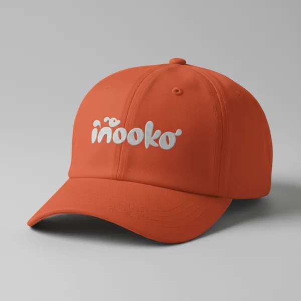 Generate a realistic hat mockup matching the uploaded logo's colors and style, with the logo clearly displayed on the front and soft lighting on a clean background.