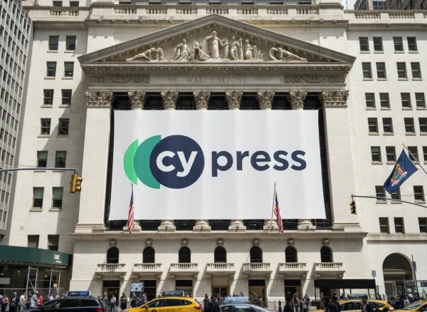 Realistic photo of the New York Stock Exchange building with a giant front banner showing the uploaded logo, as if celebrating IPO. Keep architecture, flags, and daylight city scene authentic.