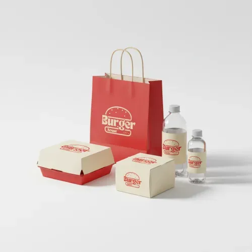 Generate a minimalist brand packaging mockup on a clean white studio surface, featuring boxes, bags, and bottles. Apply brand colors and logo from the uploaded logo consistently. Use soft natural lighting and subtle shadows for a modern, elegant look.