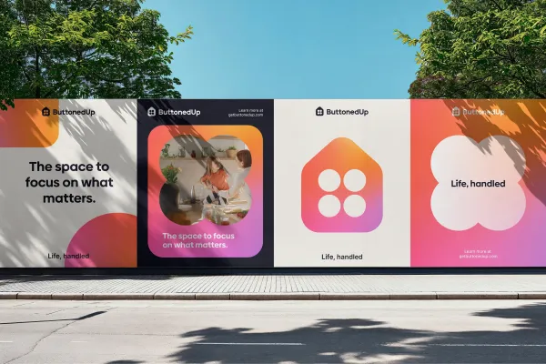 Create a professional outdoor advertising hoarding mockup showcase based on the uploaded brand assets. The scene features a long, continuous horizontal construction wall or street hoarding divided into exactly four (4) large, distinct vertical marketing posters panels arranged side-by-side along a city sidewalk and road.
The composition alternates layouts seamlessly across the four panels using the brand's identity:
The panels dynamically feature a mix of bold typographic slogans, the brand's logo, and minimalist brand icons using custom geometric frames (such as house or clover cutouts).
One panel acts as an image container, displaying lifestyle or product photography framed inside a stylized cutout graphic.
The background color blocking alternates between clean neutrals (whites/blacks) and vibrant gradient backgrounds matching the brand's primary color spectrum.
The scene is set in an outdoor urban space under a clear blue sky, framed by green tree leaves at the top corners. Bright, realistic natural sunlight casts beautiful, organic tree leaf shadows across the wall surfaces. The perspective is a wide, straight-on street view capturing the entire billboard installation. The overall aesthetic is clean, modern, architectural, and premium, automatically adapting all logos, typography, color palettes, and imagery to match the uploaded brand assets.